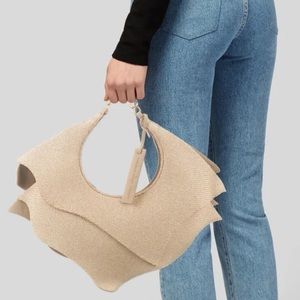 Carolina Santo Domingo raffia wavy bag.
